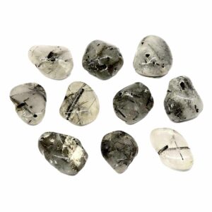 Quartz with tourmaline tumbled stones