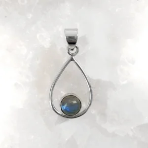 Labradorite crystal pendant with round cabochon set in a silver drop frame.