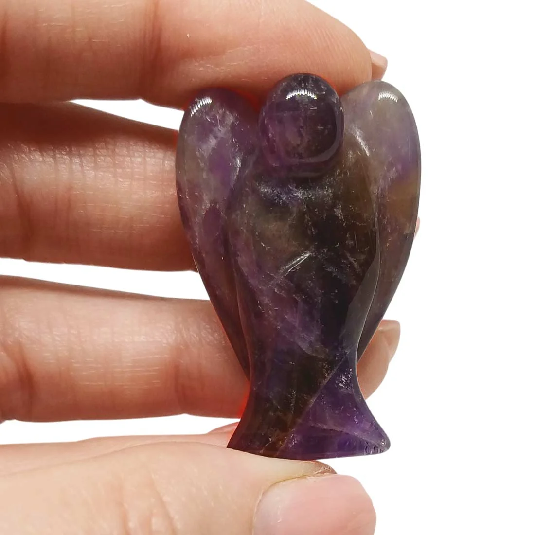 Carved Amethyst Angel figurine with polished purple tones
