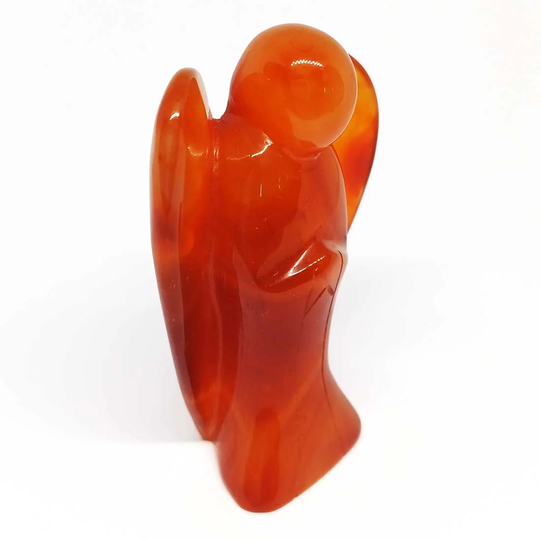 Angel figure made from vibrant orange Carnelian crystal