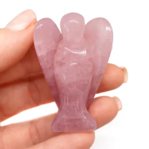 Carved Rose Quartz Angel figurine with polished surface and soft pink tones