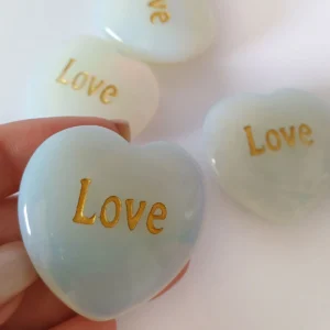 opal glass heart with engraved word , love