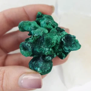 Fibrous malachite from Congo with deep green banding. A copper carbonate crystal formed in natural deposits