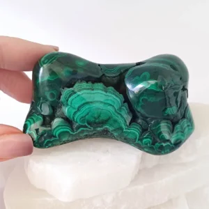 Polished malachite from Congo with rich green banding.