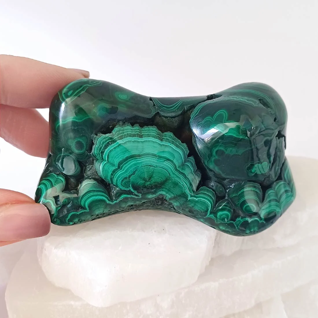 Polished malachite from Congo with rich green banding.