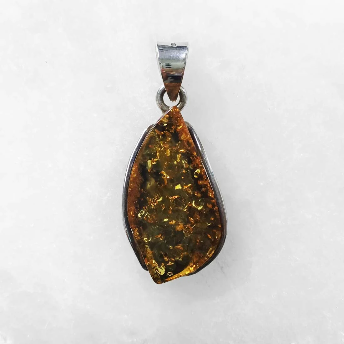 Amber Pendant with Internal Bubbles and Organic Particles – 925 Sterling Silver