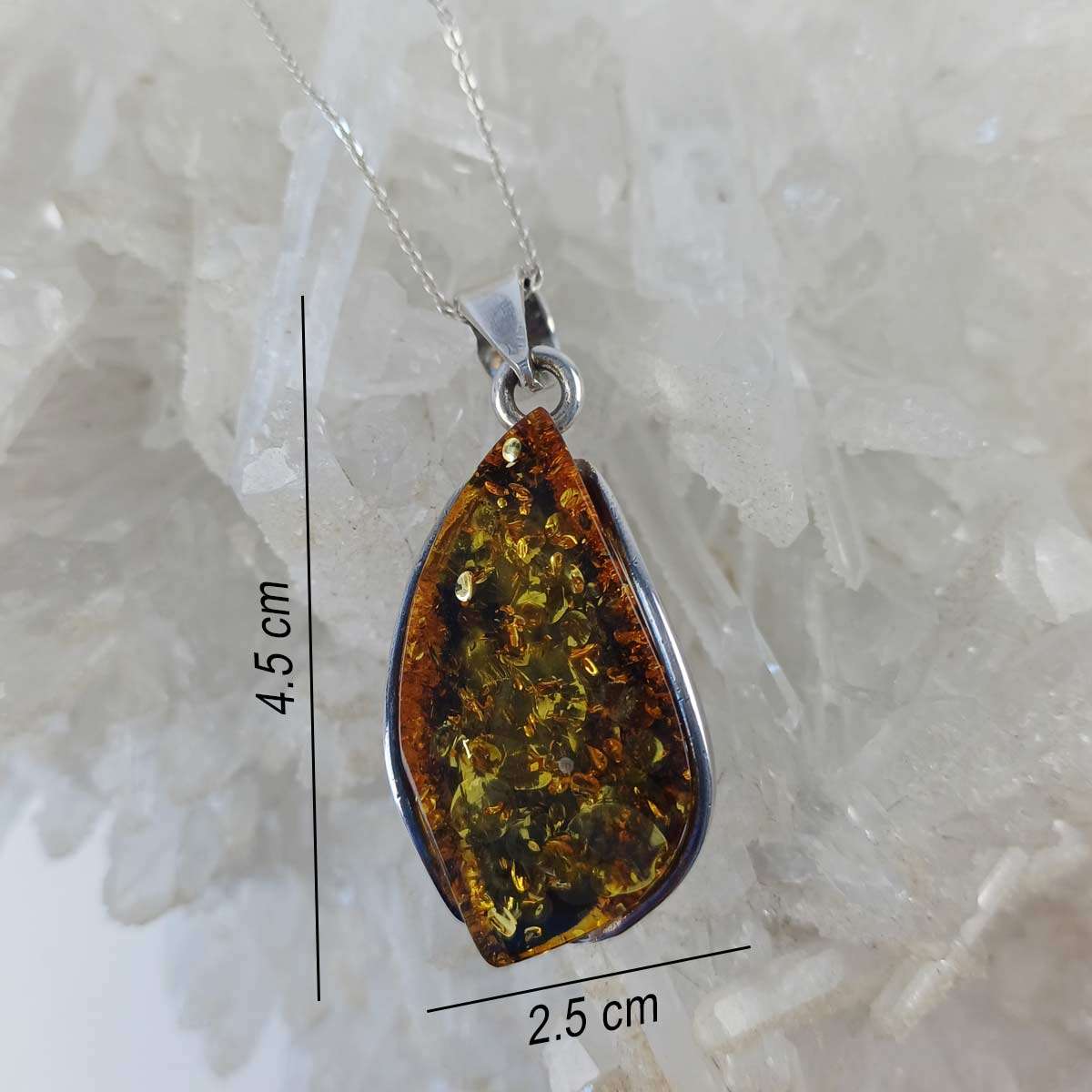 amber pendant with bubbles and organic inclusions