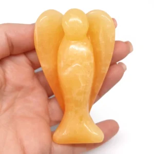 Carved Orange Calcite Angel figurine with smooth polished finish and orange tones.