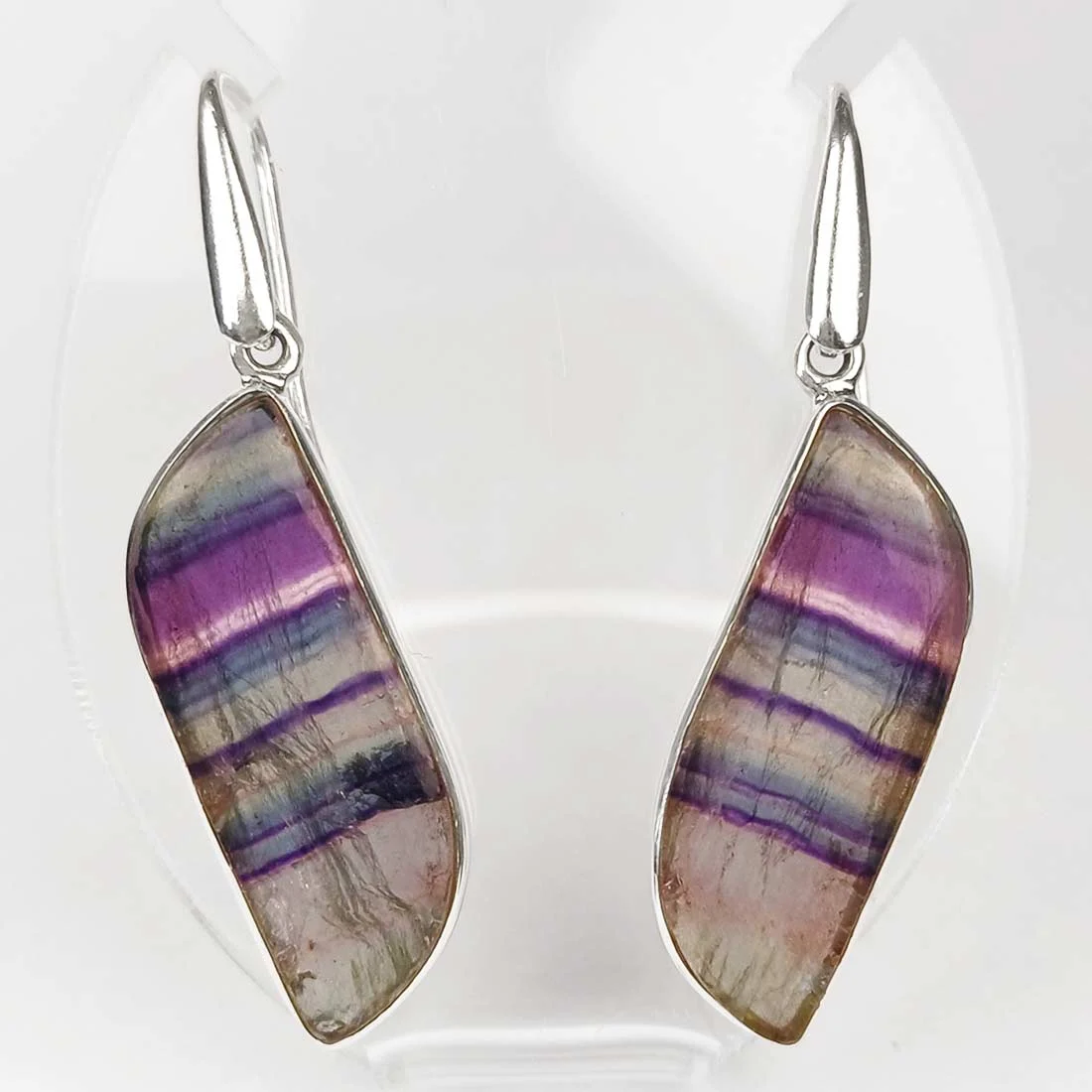 Sterling silver earrings with natural fluorite shaped as butterfly wings in green and purple tones.