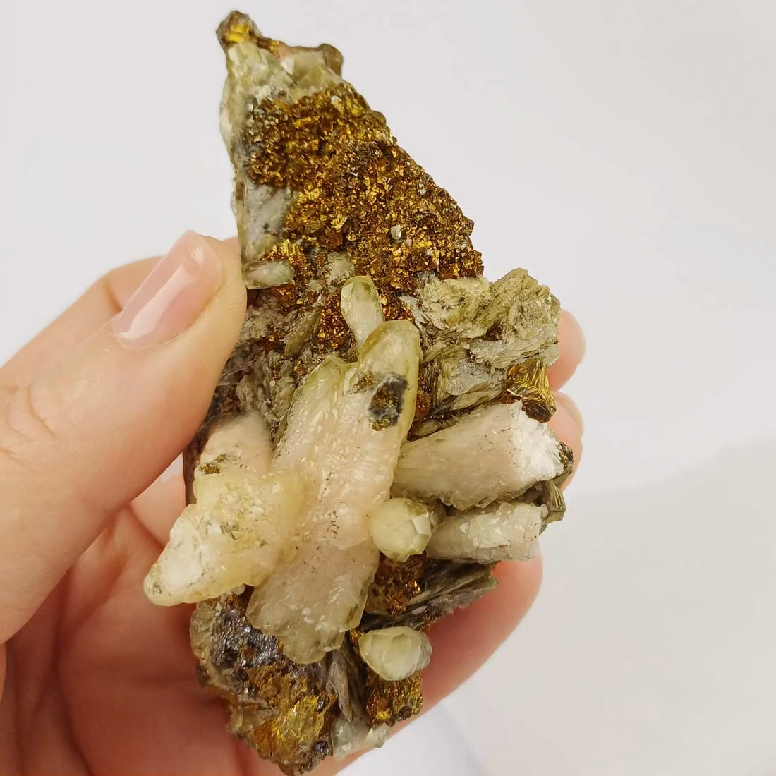 Chalcopyrite with siderite and calcite crystal cluster from China.