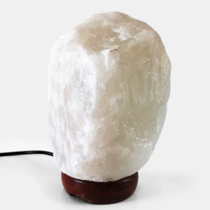 Ethically sourced white Himalayan salt lamp on wooden base