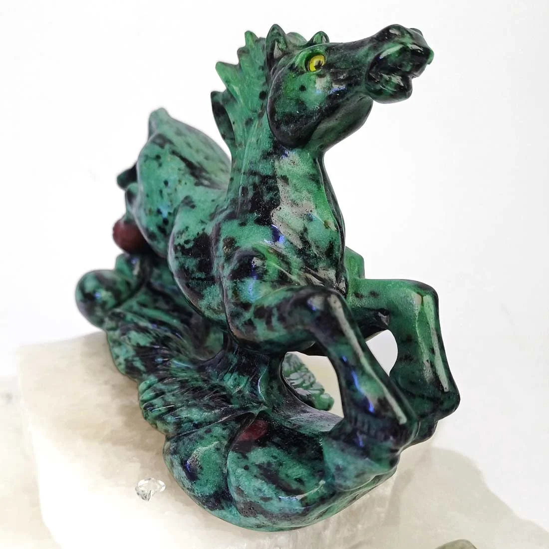 Hand-carved ruby in zoisite galloping horse