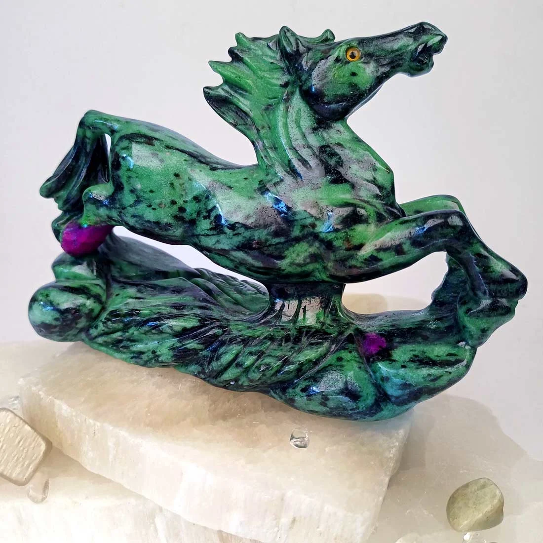 Hand-carved ruby in zoisite galloping horse