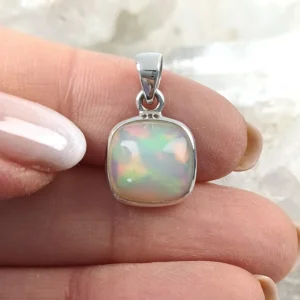 Natural Opal pendant set in 925 sterling silver showing subtle color play.