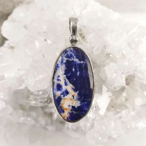 Large oval Sodalite pendant set in 925 sterling silver with natural blue and white streaks.