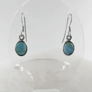 Natural apatite crystal small oval earrings in 925 sterling silver, showing blue-green tones and smooth polished surface.