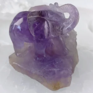 Amethyst Elephant Carving in natural amethyst crystal.