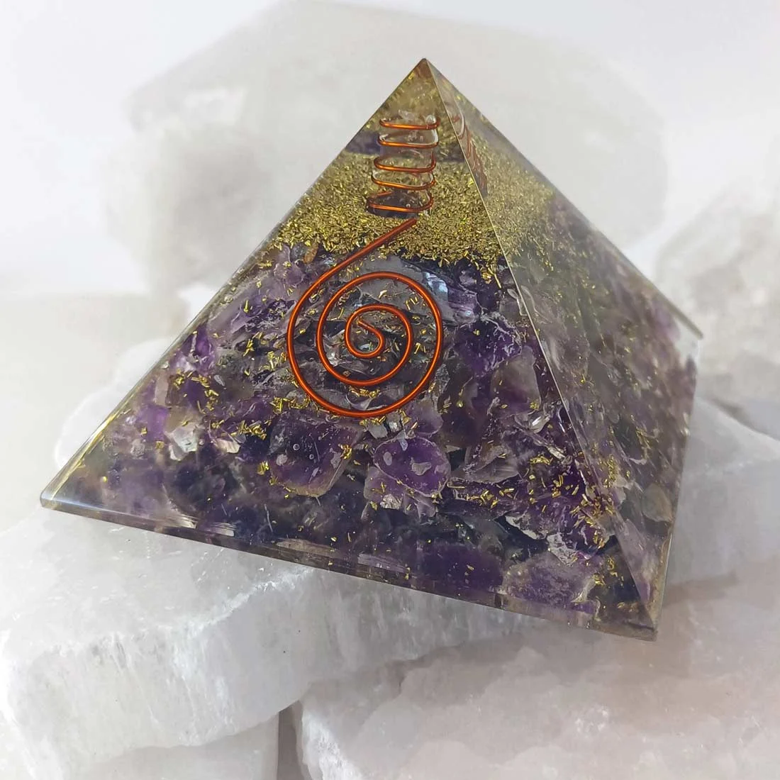 Pyramid Orgonite Amethyst made with amethyst crystal and metal shavings inside resin