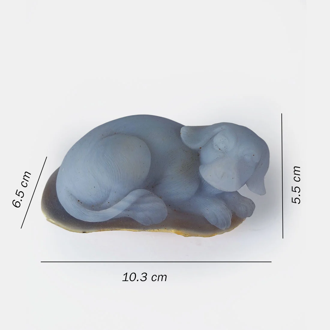 Chalcedony Resting Dog carving with smooth polished natural stone surface and soft mineral tones