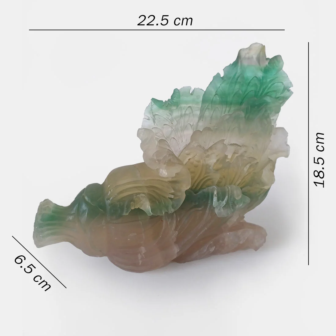 Green and cream Fluorite cornucopia crystal carving with detailed flowing carved patterns