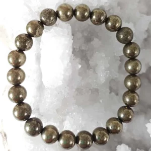 Bracelet made with natural Pyrite crystal beads in round shapes.