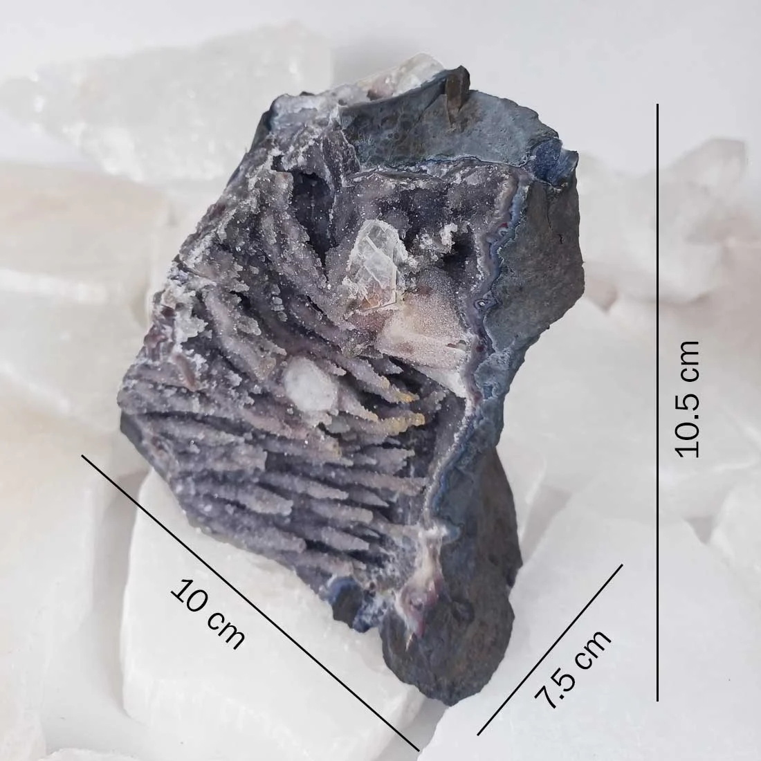 Amethyst Geode displaying stalactitic quartz formations, calcite crystals, and delicate greyish-violet amethyst