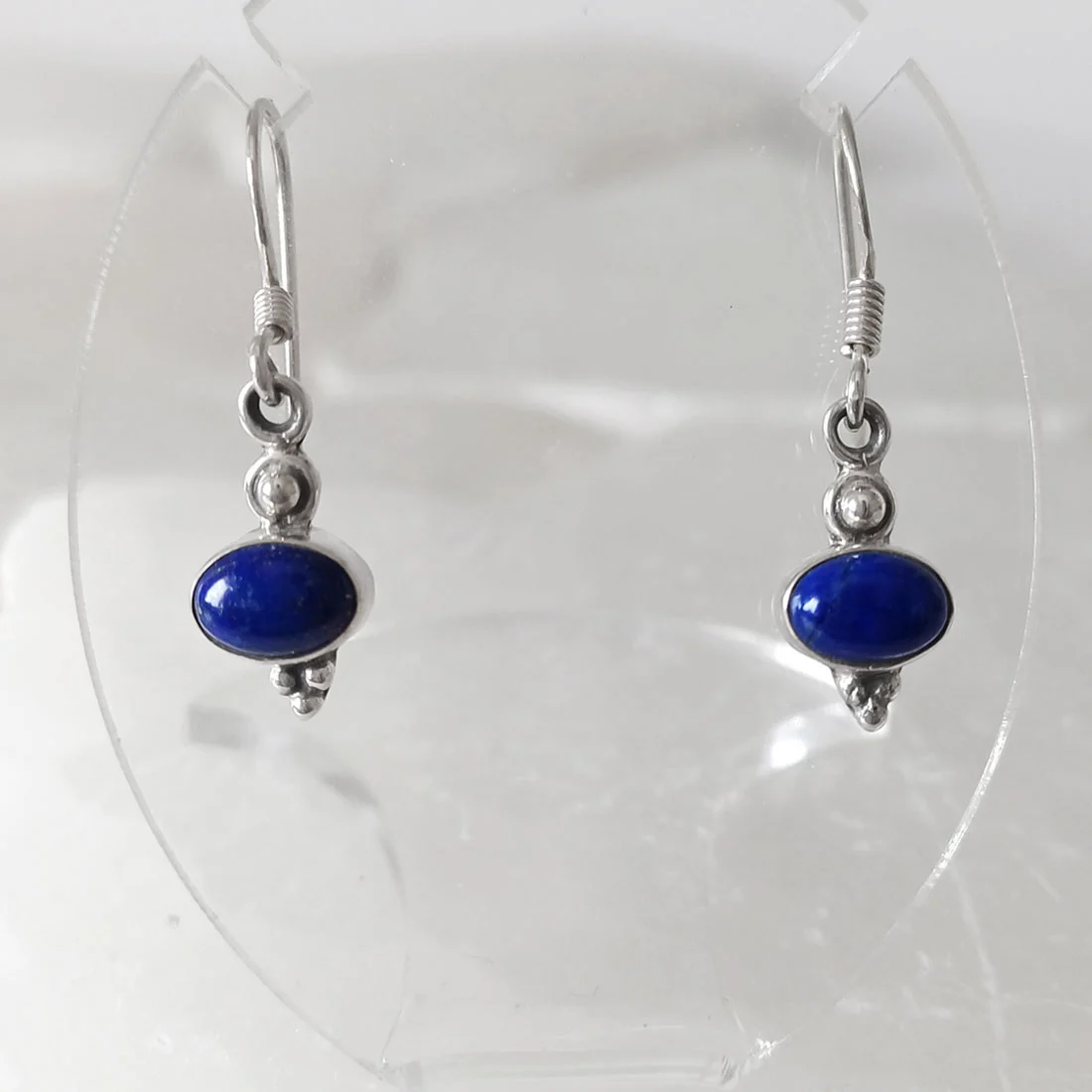 Oval Lapis Lazuli earrings set in 925 sterling silver with polished natural blue gemstones