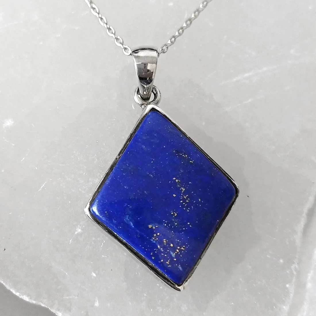 Lapis lazuli diamond pendant in sterling silver with geometric design